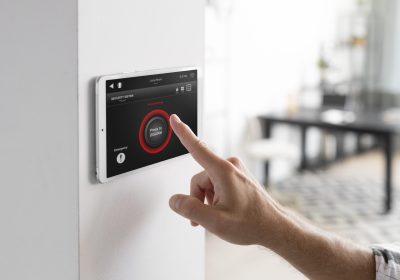 man using tablet his smart home
